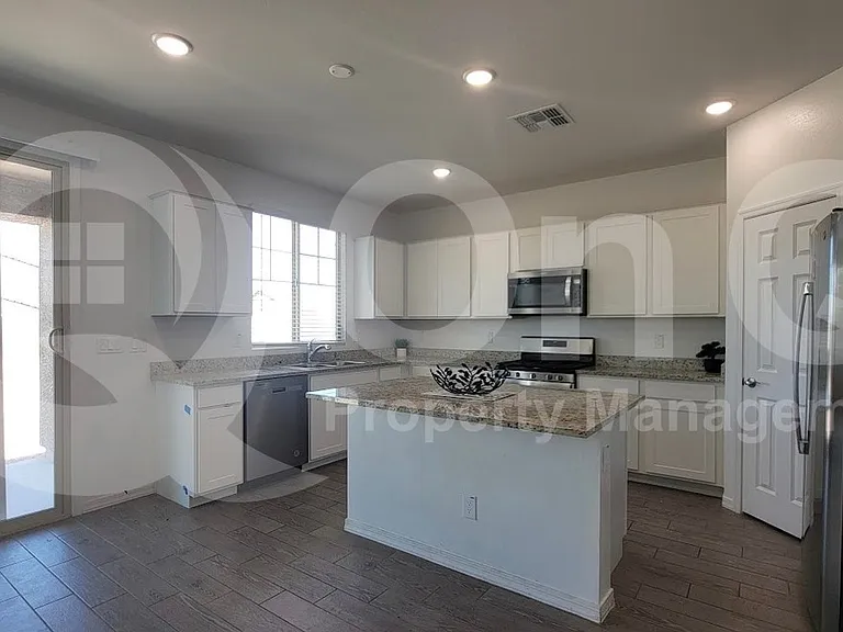 10838 W Marguerite Ave — Photo 3