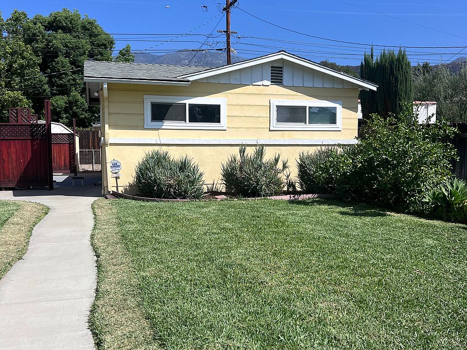 Front of the little yellow house