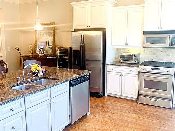 Stainless appliances remain.