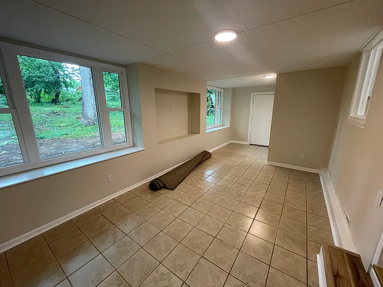 Rec. room. By the back door is Laundry room
