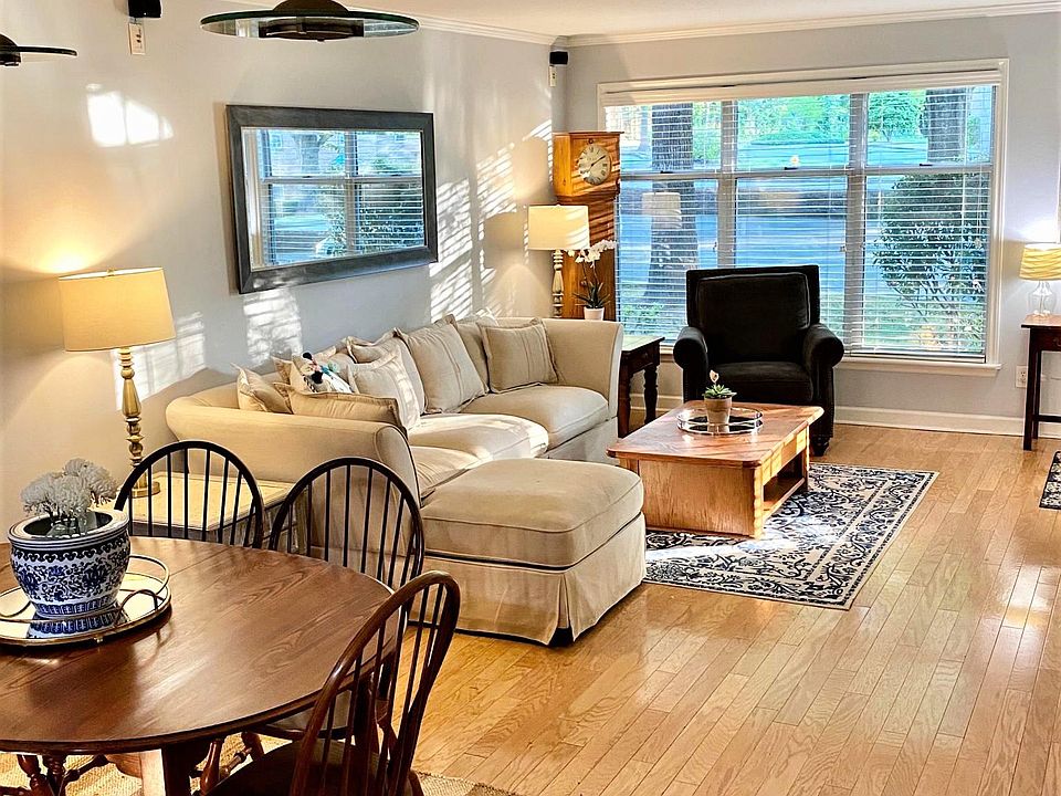 Bright open living spaces with beautiful matching hardwoods throughout all living spaces, closets, and bedrooms