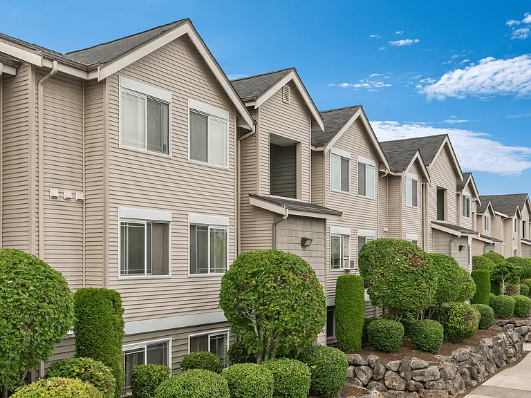 Beautifully maintained apartment exteriors with modern design and lush landscaping.