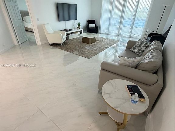 2nd image of 3500 Mystic Pointe Dr APT 405