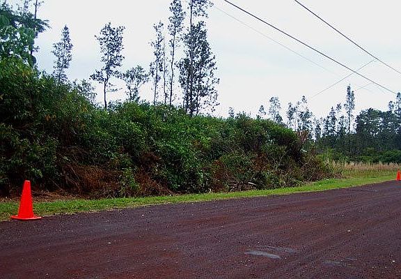 Lot 21 is to the left, approximately between the two orange cones.