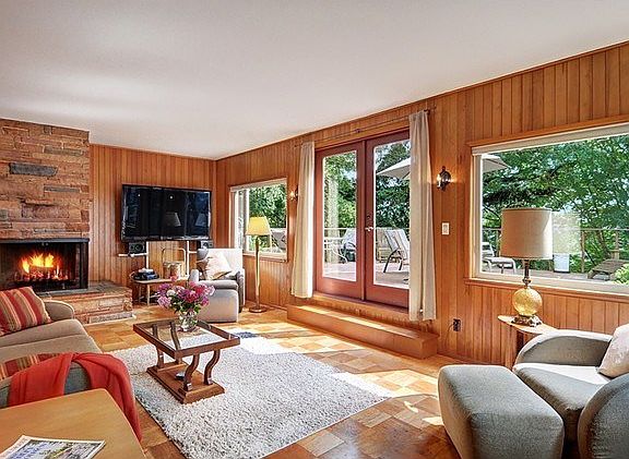 Totally retro "50's" with corner sandstone fireplace and Oak par