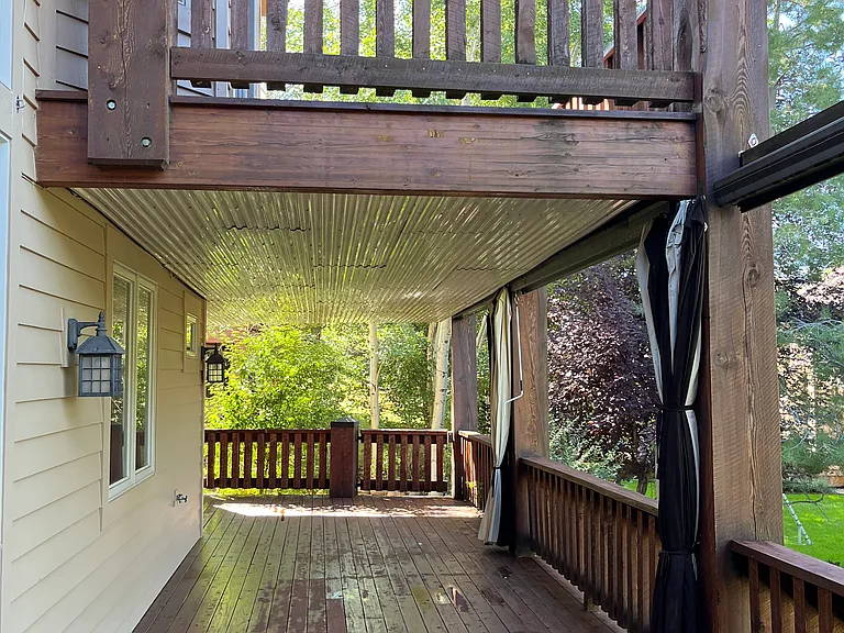 Upper deck is off the primary bedroom, lower covered deck is off the main level living.