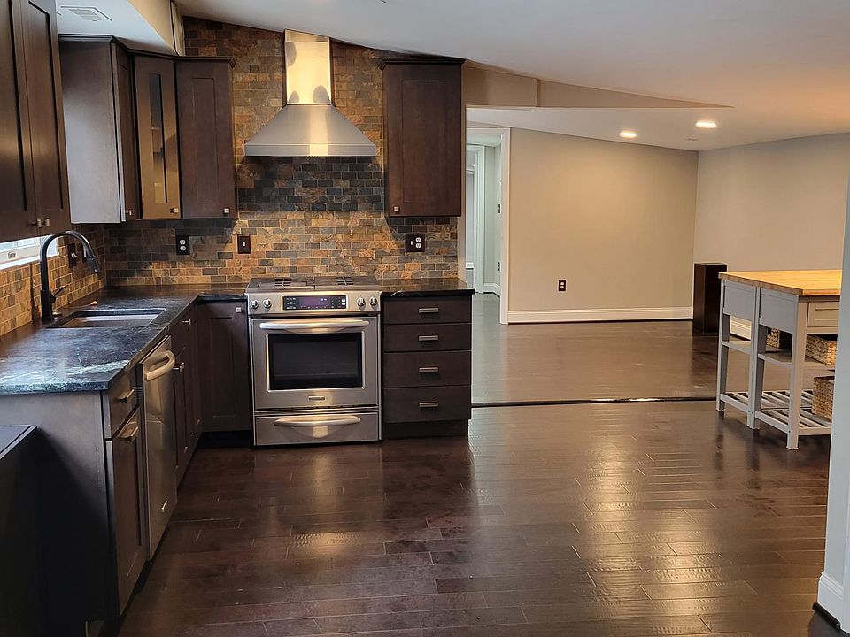 Kitchen and front door area to dining room.