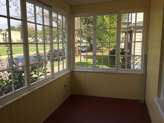 Enclosed porch off the living room in the front of the house