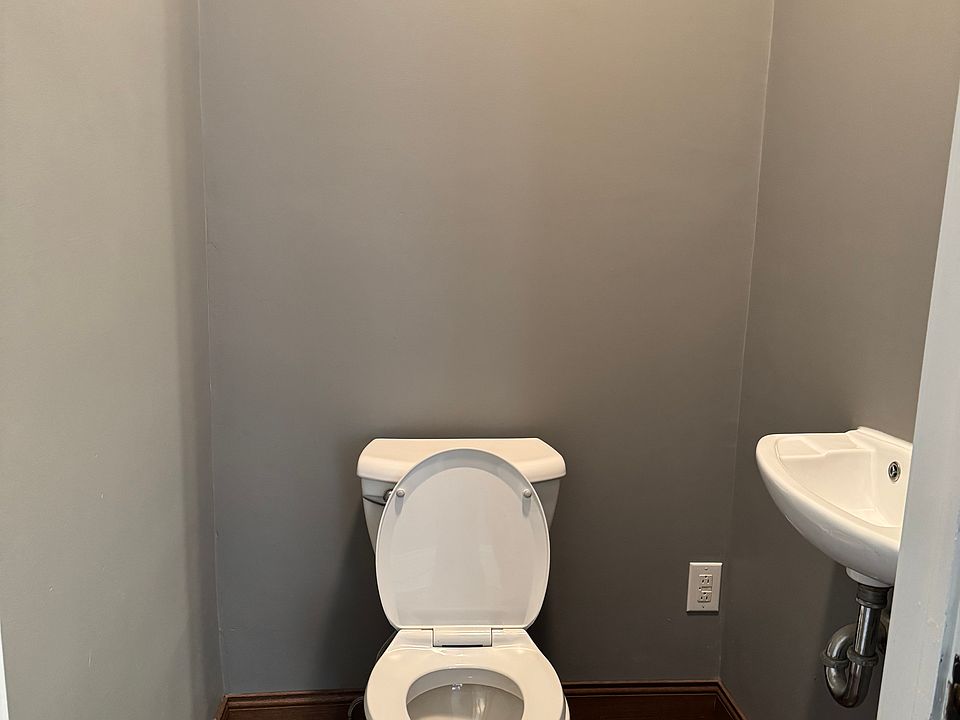 Half bath for guests located off the family room