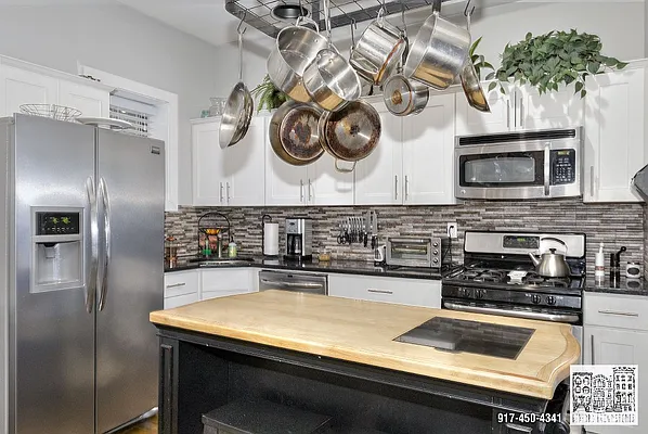 Sold by Bedford Brownstone Realty | media 10