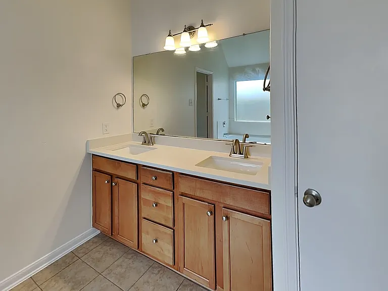 Modern bathroom features a lar