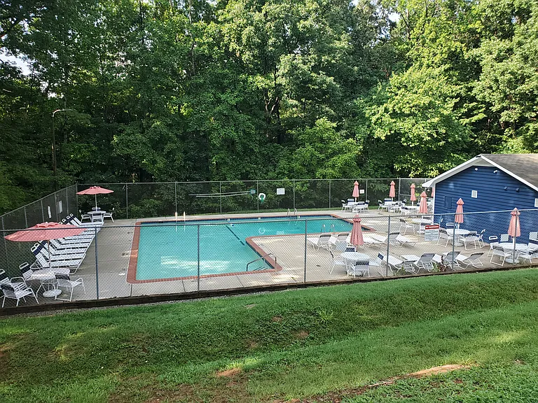The pool is part of the amenities package but is not adjacent to, nor visible from the listed property.