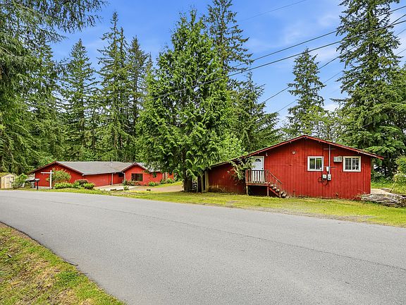 Primary home in Distance and entrance to the office on 2nd level of the Barn.
