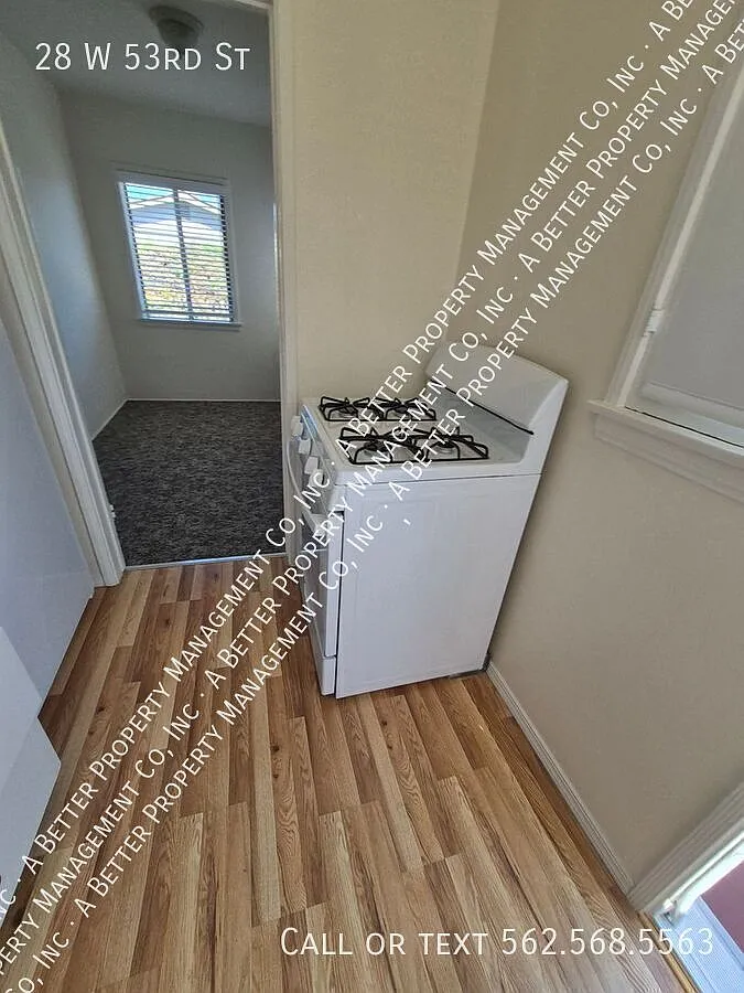 Front 1 Bed House w/New Flooring! Includes Storage Garage — Photo 3