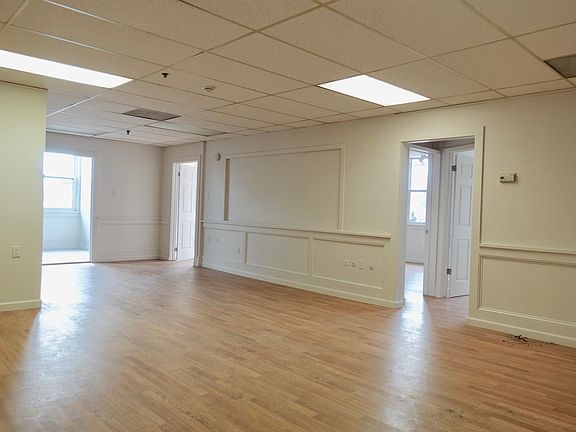 OLDE Burlington City ~ our Building : 3 Bedroom Unit Corner Neo Classic historical mid-century Building , new double paned glass windows, newly painted, new floor.