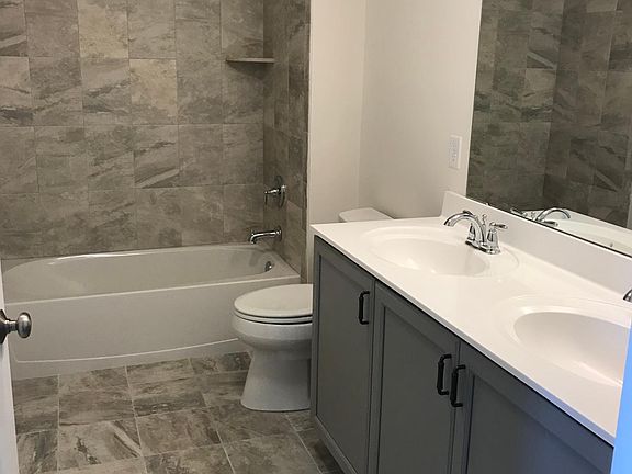 Bathroom with double bowl vanity