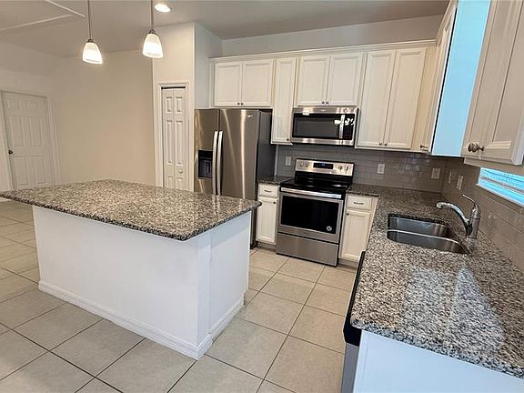 4th image of 6910 Tussilago Way