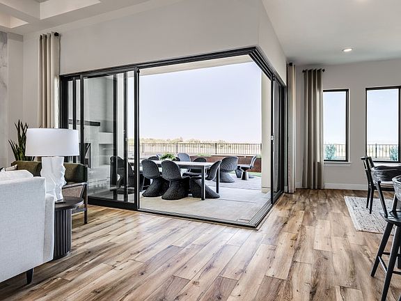 Lots of natural light throughout due to the oversized windows and doors.