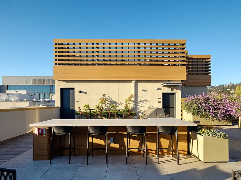 Dine al fresco on our well-appointed rooftop deck.