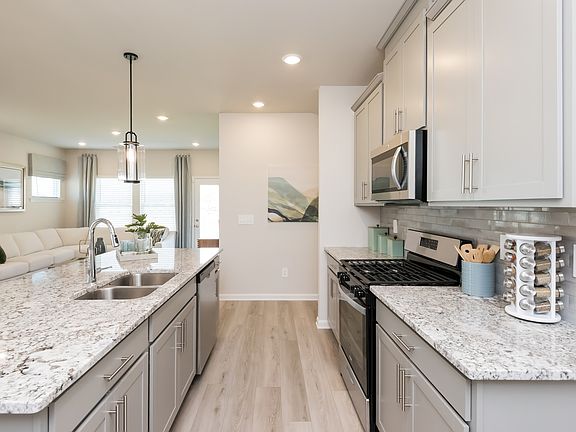Kitchen in the Roswell floorplan at a Meritage Homes community in Atlanta, GA.
