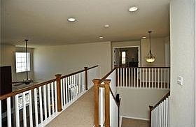 Catwalk overlooking family room and city lights