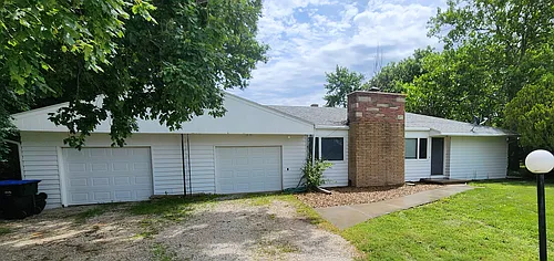9036 NW Rochester Rd Photo 1
