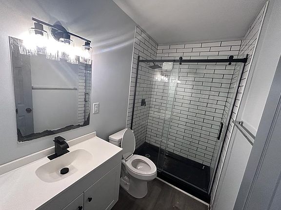 Spacious shower in shared bathroom