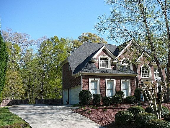 3 Car garage brick wall parking courtyard