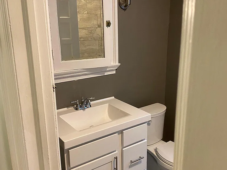 New Bathroom Vanity, Toilet and Tile Floor