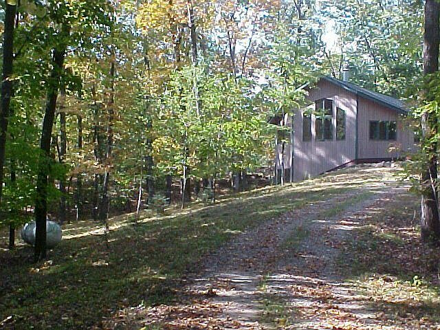 From mid-point of driveway