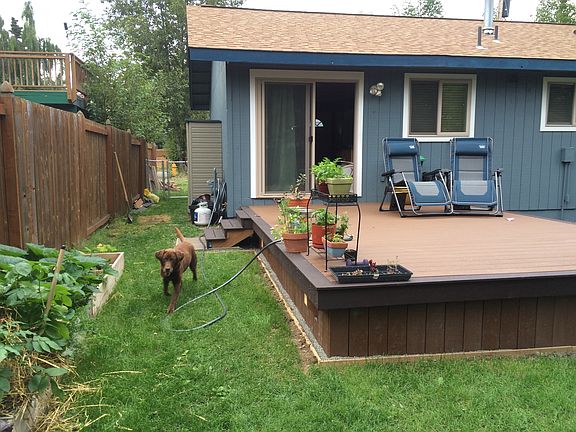 Summer Photo of Back Deck and Yard.