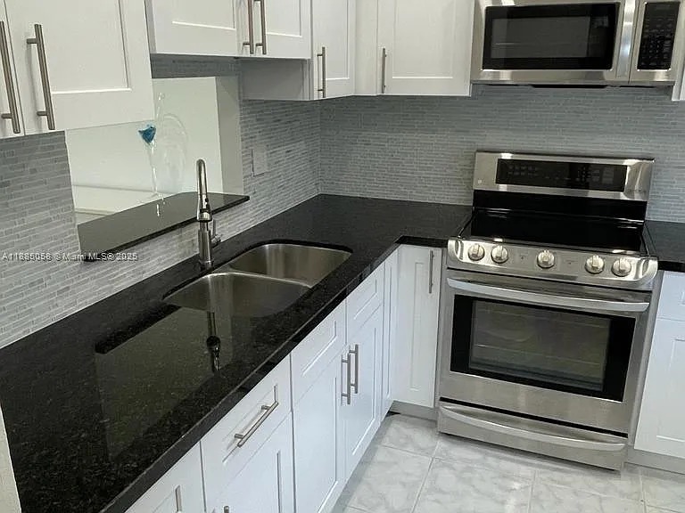 5051 W Oakland Park Blvd #204 — Photo 32