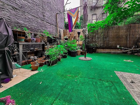 2nd image of 212 E 10th St APT 2C
