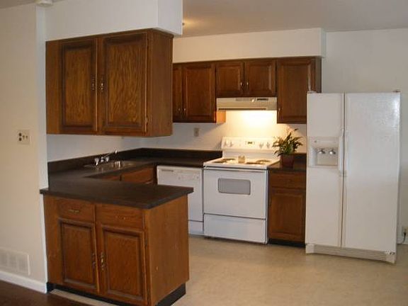 Kitchen From Dining Rm.