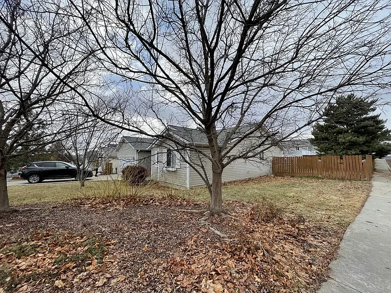 View of property from street. Fenced backyard.