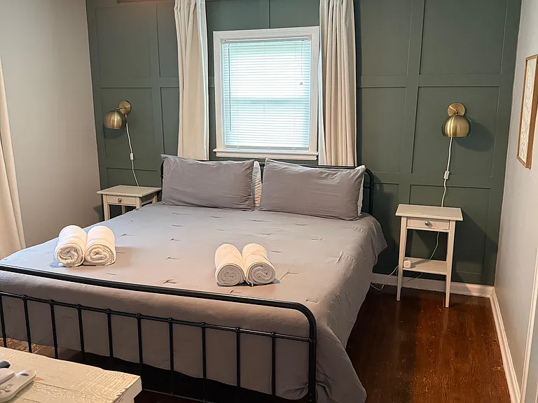 Primary bedroom that comfortably fits king bed