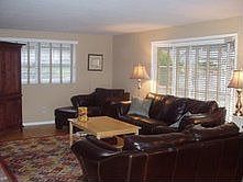 Living room w/bay window and fireplace