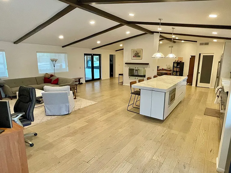 Living Room, Kitchen, Dining room in the back and front door