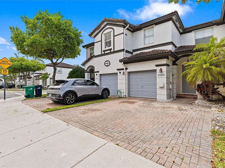 11476 NW 77th Ln — Photo 42