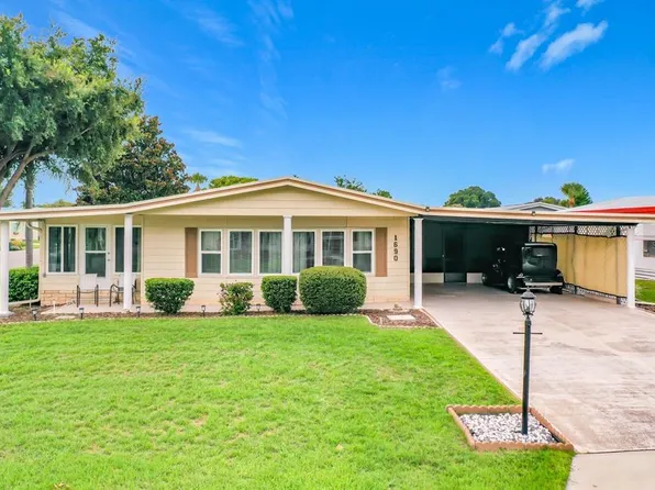1690 NASSAU CIRCLE, TAVARES, FL 32778
