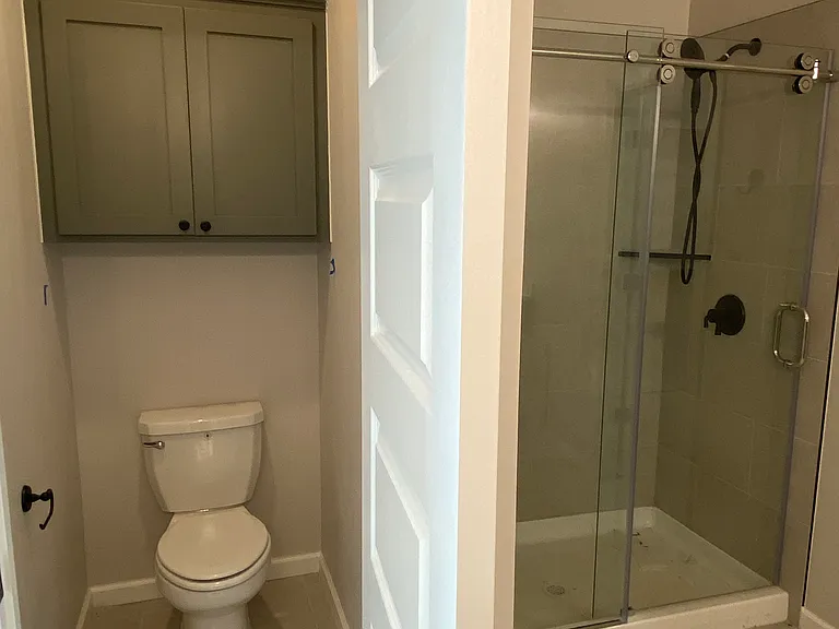 Primary Bathroom Toilet Room and Shower