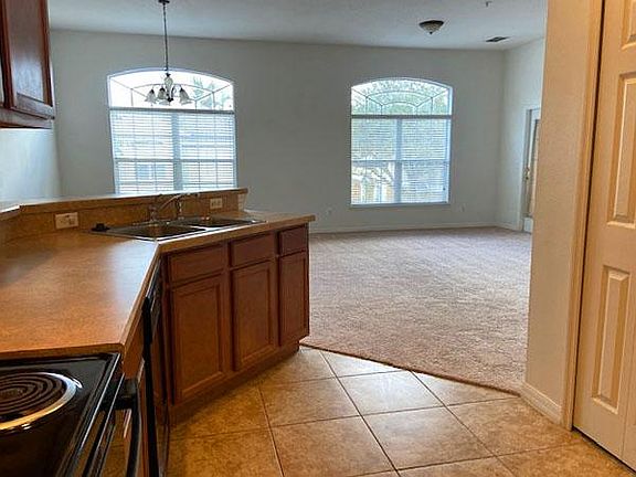 Large living-dining area adjoins kitchen so you never miss a thing!