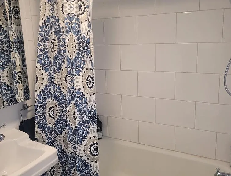 Remodeled Bathroom with new Tiles on the tub and floor, new Sink and new Toilet. Toilet also has a Bidet seat.