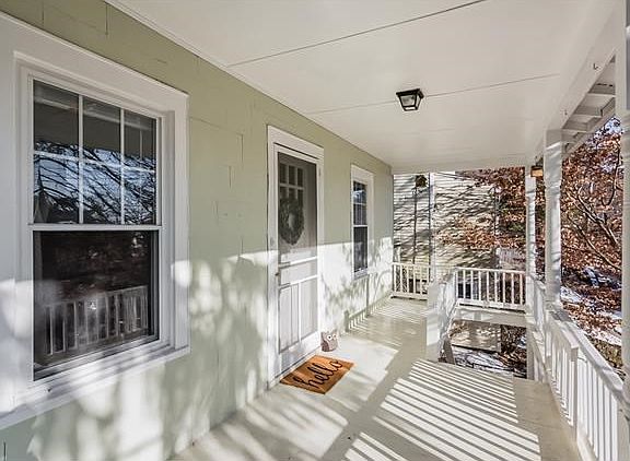 Charming Front Porch. Great place to sit and enjoy morning