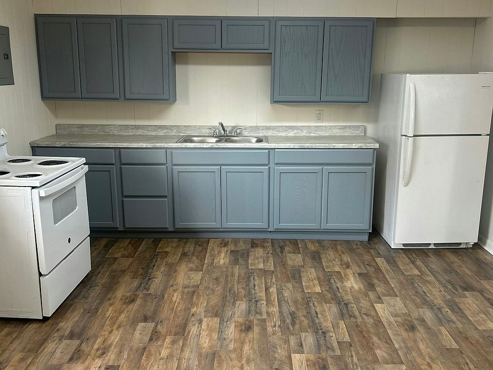 Newly renovated kitchen with fresh paint and modern finishes, ready for your personal touch!
