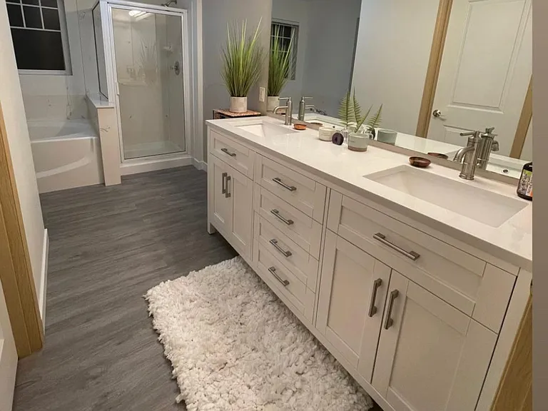 Master bathroom - shower, bathtub, toilet room & full walk-in closet. Newly renovated bathroom with new vanity & flooring.