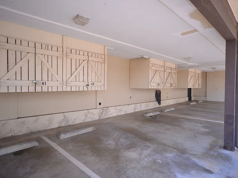 Ocean View Townhomes parking area and outdoor storage locker