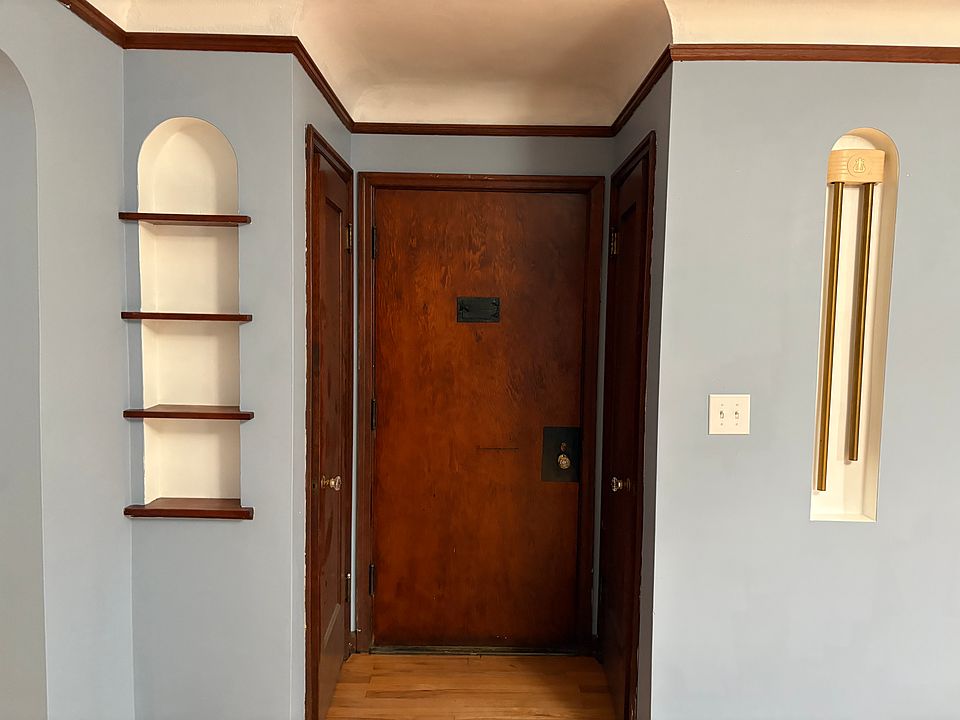 Cute original fixtures! Giant closets on each side of front door.