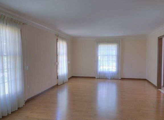 Living Room...maple flooring...25' x 14'...