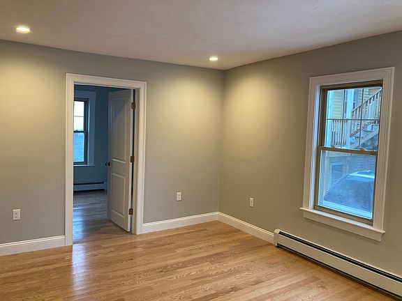 Living room looking into second bedroom